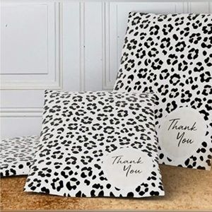 Sellers bundle 100 thank you stickers and 20 10x13 packing envelopes.